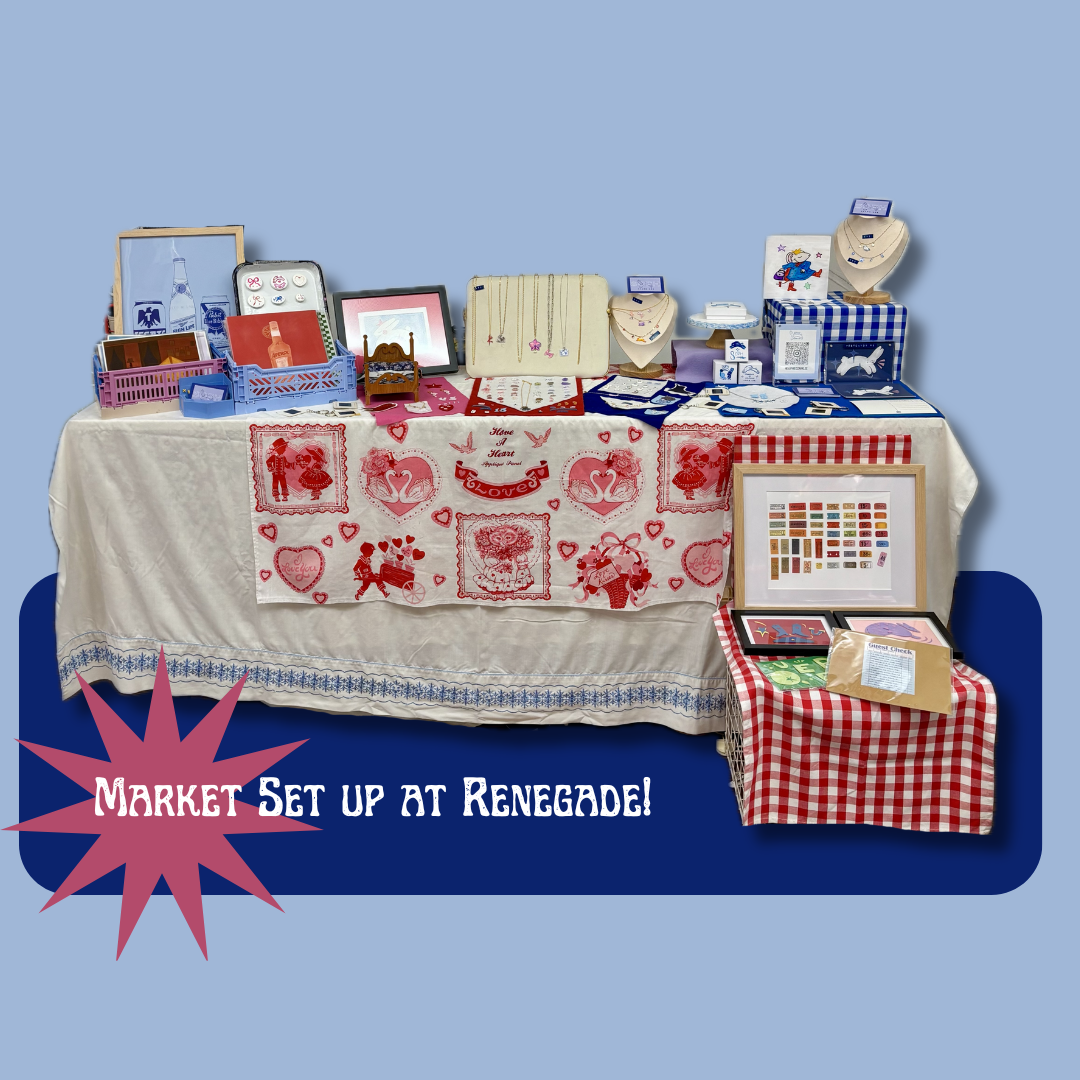 Table with various items on a blue background with text 'Market Set up at Renegade!'.